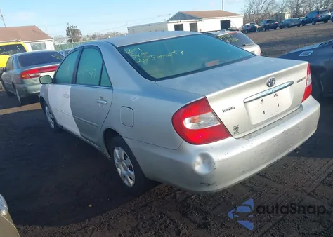 2003 Toyota Camry Le z USA, uszkodzony, nr VIN 4T1BE32K33U183543
